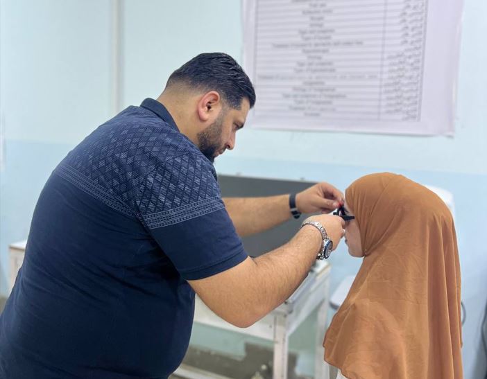 A practical scientific workshop for the lecturer, M. M. Muhaymen Samir Arif, entitled (Training and examining students of the Optics Technology Department)