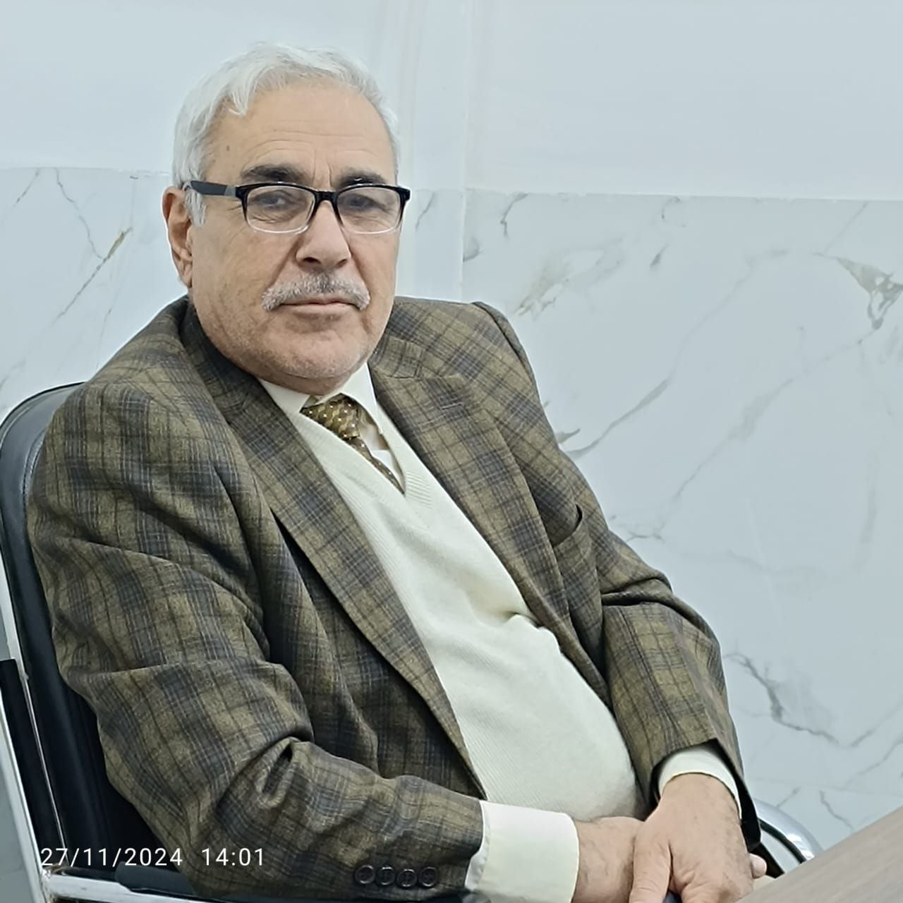 Article titled "The relationship between poetry and painting" by Dr. Hamzah Allawi Musrebet. 