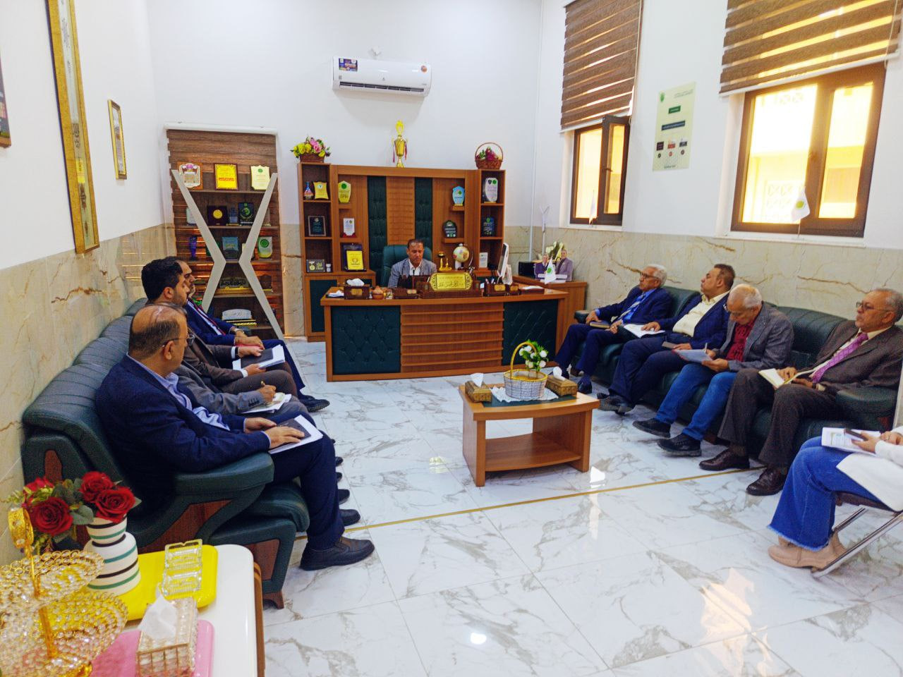 The Dean of the College of Engineering holds a meeting with the heads of engineering departments to discuss program accreditation and develop curricula