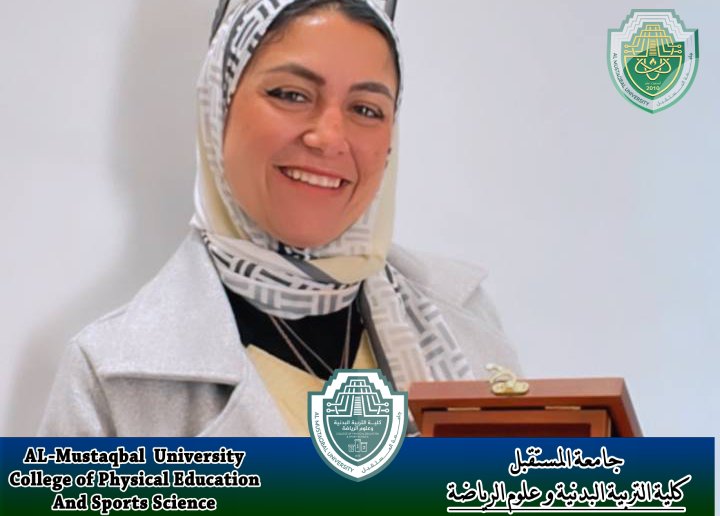 تدريسية في كلية التربية البدنية و علوم الرياضة تحصل على درع الابداع  من رئيس جامعة
