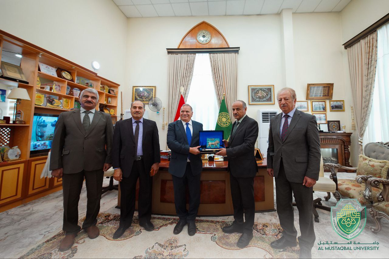 President of Al-Mustaqbal University Signs a Cooperation Agreement  with the President of Kufa University