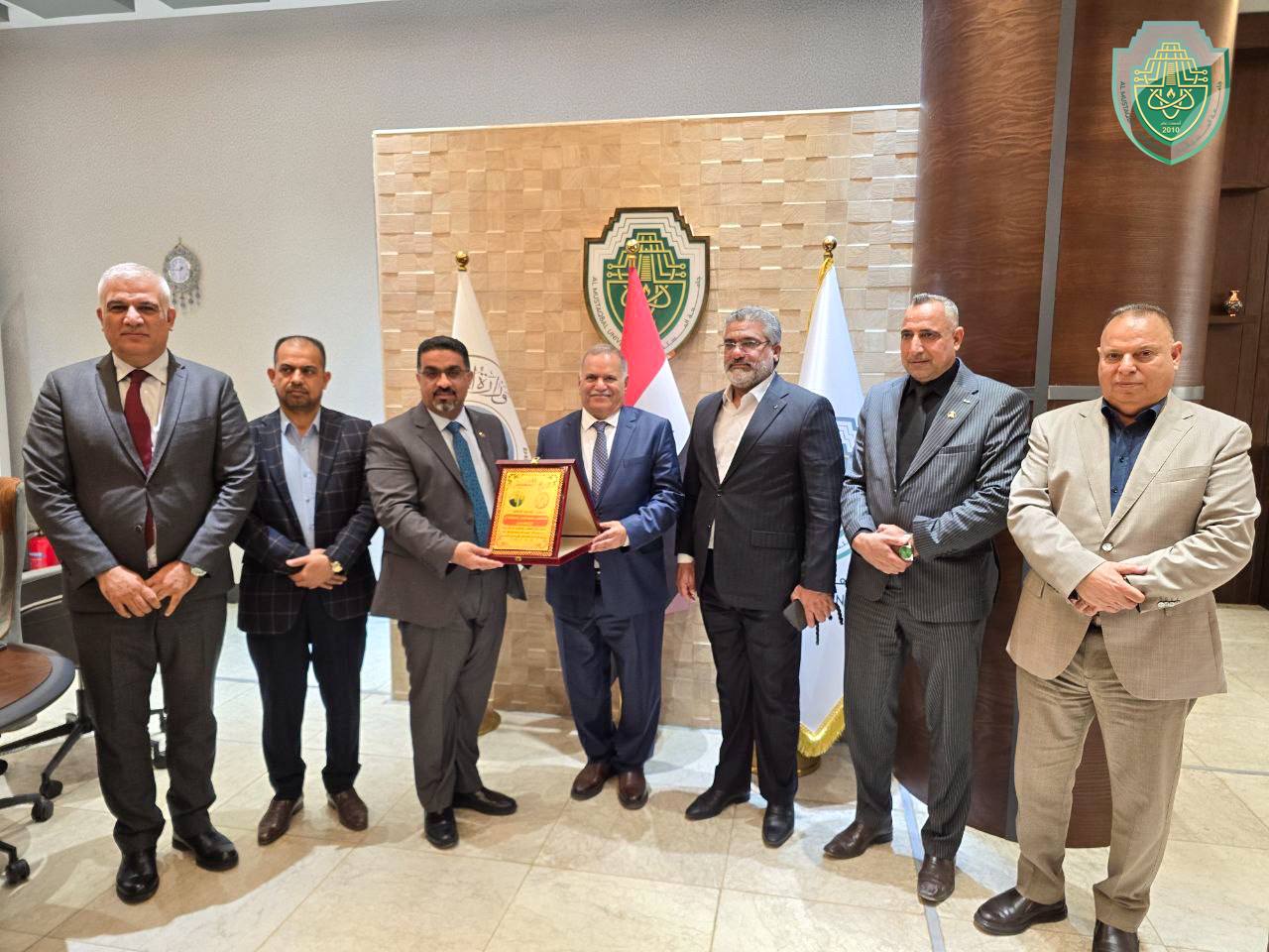 Teachers Syndicate Honors Al-Mustaqbal University President with the Distinction Shield